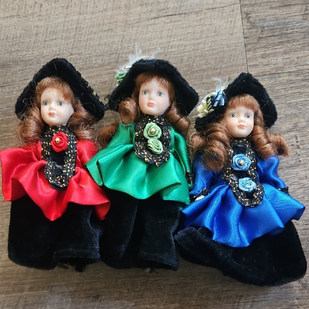 Set of Three Colorful Porcelain Dolls